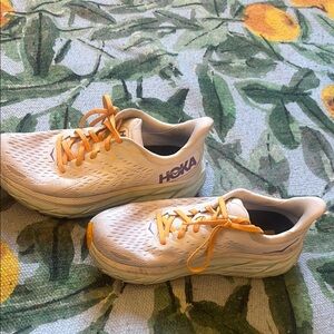 Hoka Running Shoes with Orange Accents